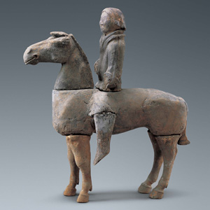 Earthenware cavalryman on horse back with inscription of 